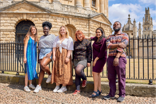 An image of six people standing in a row in front of the Bodlean Library in Oxford. They are new the Sabbatical Officers 2022