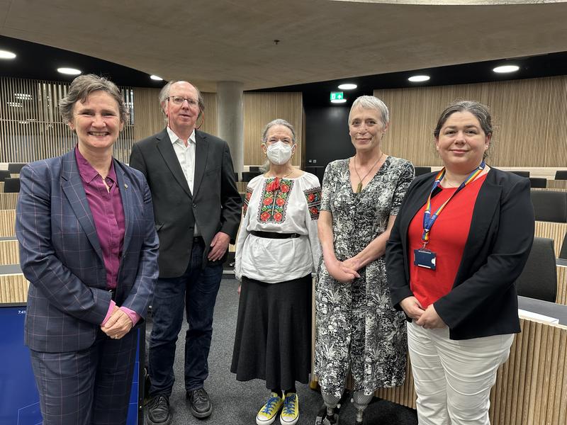 The VC, Sam Howison, Elizabeth Frood, Catherine Walter and Teresa Pedroso in a lecture theatre at the Blavatnik School of Government
